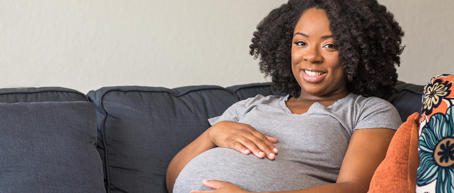 Pregnancy woman on a couch
